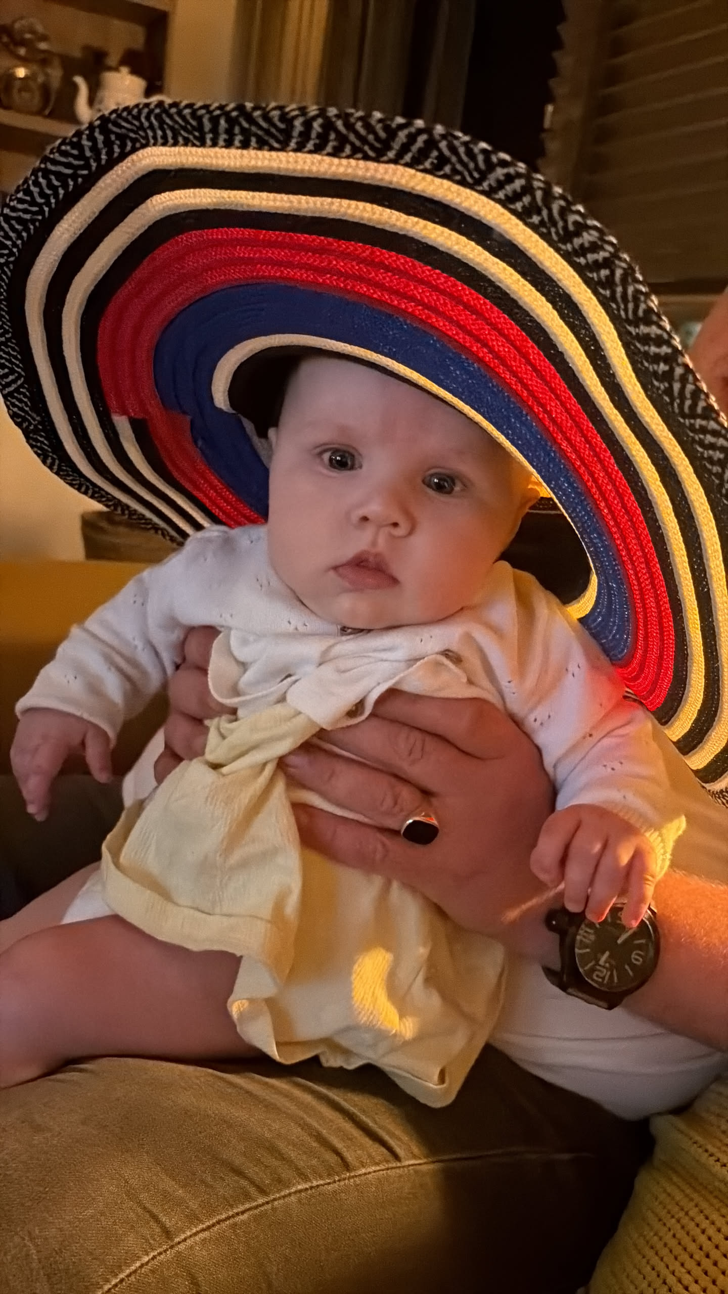Olivia wearing a wonderfully oversized striped hat